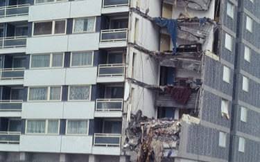 The damaged corner of the Ronan Point tower block, with its floors torn open.
