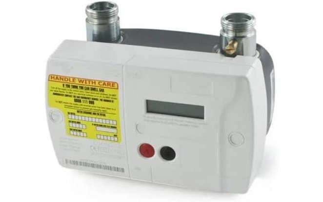 A white smart gas meter with a small display.